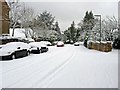 A snow-covered Albury Road in GU1 2HD