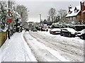 Snow in Epsom Road (A246) in GU1 3SP