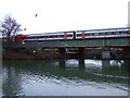 East Midlands train crossing the River Nene at Peterborough in PE2 9NR