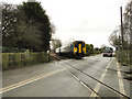 Passing over the level crossing at Rackheath in NR13 5FW