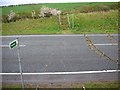 Footpath crosses road in NN15 5YF