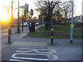 Junction of Glebe Path and Upper Green, Mitcham in CR4 4LZ