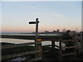 Signpost to Langport along the river Parrett. in TA10 0DG
