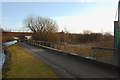 Railway crossing canal in WN6 7GB