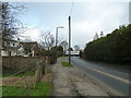 Looking back down the B2166 towards the Walnut Tree Roundabout in PO20 1JH