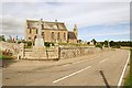 Kilmuir Kirk and war memorial. in IV18 0NG