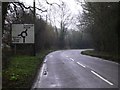 Roundabout sign on Run Common Road in GU6 8QY