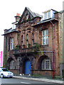 Red sandstone building on Ferguslie in PA2 9EN