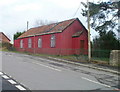 Red corrugated building, Cilfrew in SA10 8LA