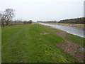 Ramp down to river level in flood banking in PR26 9AS