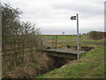 Bridge, Signpost, Stile in West Torrington