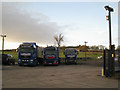 Trucks on hardstanding by A3400 in B95 5QT