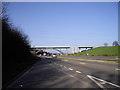 Bridge and power lines over the A4042, near Llantarnam in NP44 3HE
