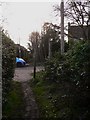 Footpath to Three Stiles Road in GU10 5EA