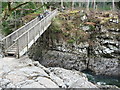 Walkers ascend the Miner's Bridge at Betws-y-Coed in LL24 0DA