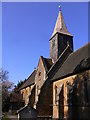 Busbridge church seen from graveyard in GU7 1TL