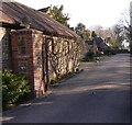 Footpath through the grounds of Moushill Manor near Milford in GU8 5EJ