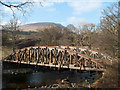 Old railway bridge across River Greta in CA12 4AJ