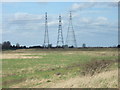 Small, medium and large - pylons near Foul Anchor in PE13 5PR