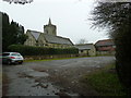 Holy Trinity church and car park in Lower Beeding