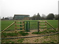 Gate and barn in RG8 7PB