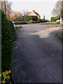 Footpath reaches road at Isington Close in GU34 4PR