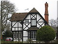 Tudorbethan gatehouse on St Audrie's estate in TA4 4DL