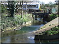 Train crossing the Ravensbourne near Catford in SE6 4QA