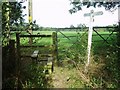 Footpath sign and stile at Gt.Strudgate Farm in RH17 6RB