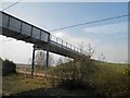 Another view of the footbridge across the east Coast main line in PE7 8US