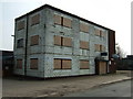 Boarded up office block on Horseshoe Road, Spalding in PE11 3JA