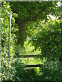 Footpath signpost and stile in HP23 6PB