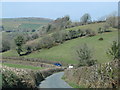Road drops into the Fowey valley in PL14 6JY
