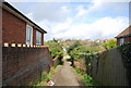 Footpath off Tudor Avenue in TN38 0UL
