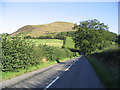 Looking down the B6356 road with Black Hill behind in TD4 6BW