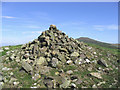 The summit cairn of Hownam Steeple in TD5 8AL