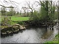 Destroyed footbridge on River Llan near Ystrad Isaf in SA5 4BT