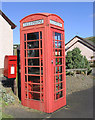Post box and telephone box at Ashkirk in TD7 4NU