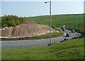 Bend on New Road (A629), Denholme in BD13 4DN