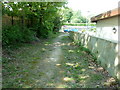 Footpath 15CR approaching service road in RH17 5QD