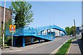 Blue footbridge in London Road (1) in PO6 2SJ