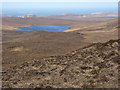 Moorland leading down to Loch Carn Mharasaid in IV27 4RQ