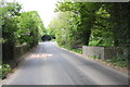 Ickleton Road with bridge at approach to Ham Road junction in OX12 7BB