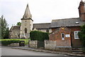 Looking across Church Street to the Police Station and Holy Trinity Church in OX12 8TP