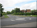 Mini roundabout at junction of Westmorland Way and Burn Lane in Newton Aycliffe in DL5 4UY
