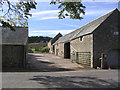 Farm buildings at Oxnam Row in TD8 6RG