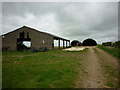 Barns off Stonepit Hill (road) in YO25 3XF
