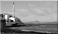 Bowmore Distillery from the Shore, Islay in PA43 7JX