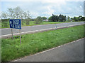 Slip road and sign at junction 21 southbound in DG11 3NH