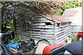 Benchmarked shed on east side Chalk Hill in Aston Tirrold